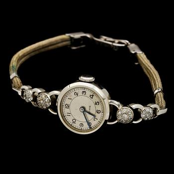 DAMARMBANDSUR, platina med 32 små diamanter, Schweiz, 1900-talets andra hälft. Vikt 10 g.