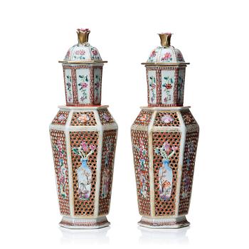 A pair of famille rose vases with covers, Qing dynasty, Qianlong (1736-95).