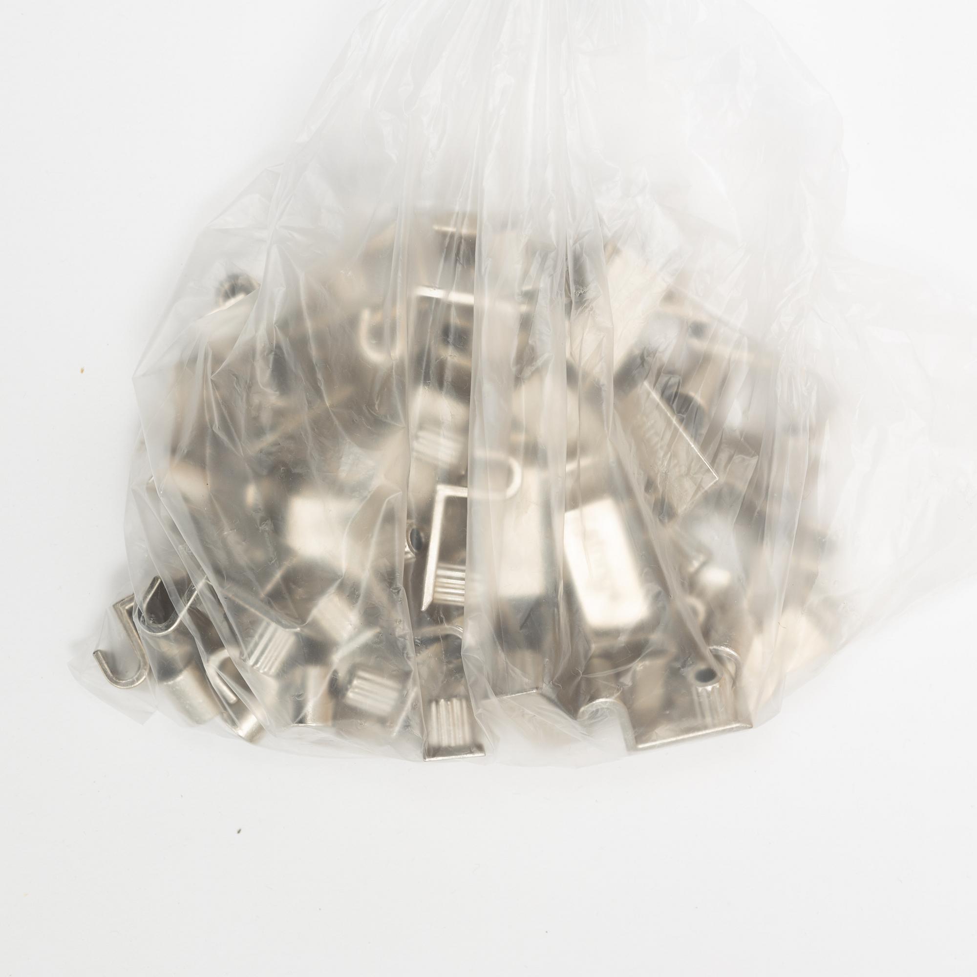 A 'String' shelving system by Nils Strinning, with three sides and 12 shelves.