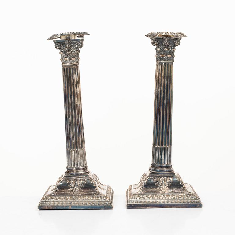 A pair of silver plate candlesticks, no marks, 20th century.