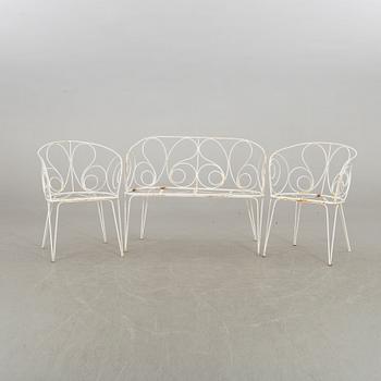 a 3 piece set of garden furniture, mid 20th century.