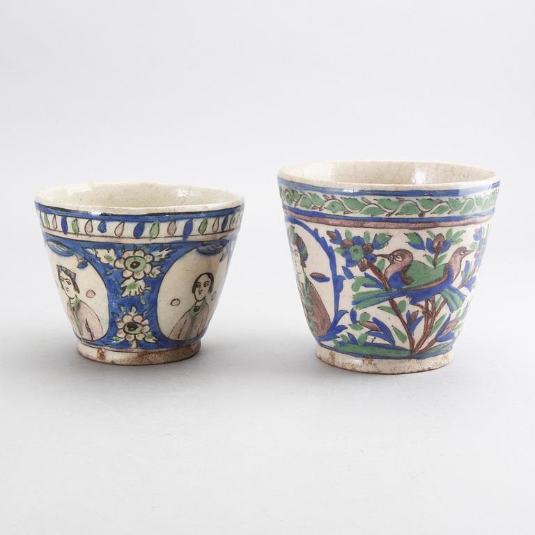 A set of two 19th century Persian earthenware pots.