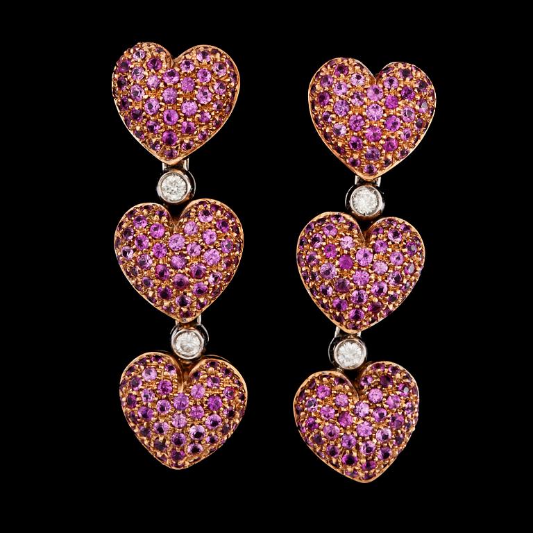 A pair of pink sapphire and brilliant cut diamond earrings.