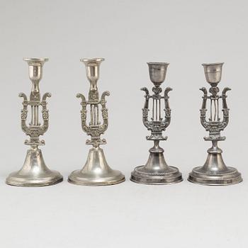 Two pair of Swedish pewter candlesticks, early 19th century and ca 1900.