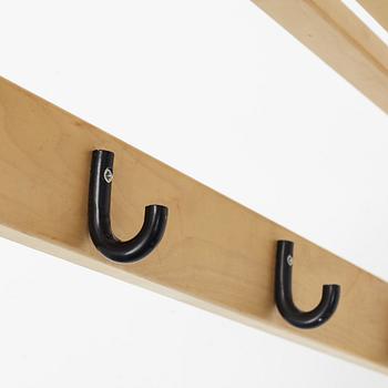 Alvar Aalto, a model 109 coat rack from Artek, Finland.