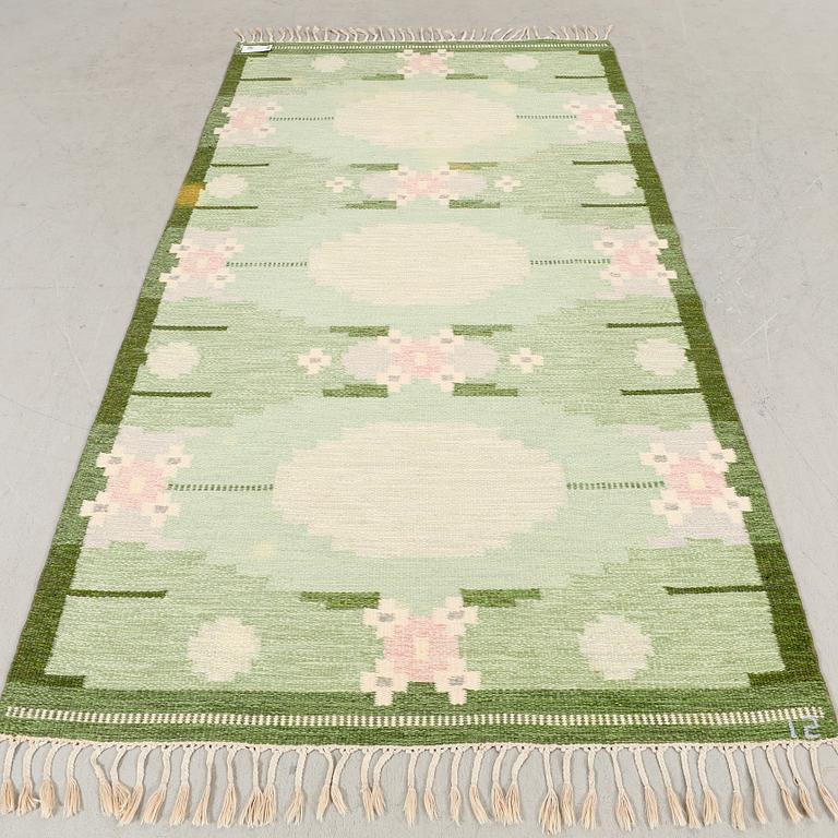 Ingegerd Silow,a signed flat weave carpet approx 251x131 cm.