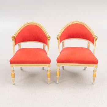 A pair of late Gustavian-style open armchairs, first part 19th century and circa 1900.