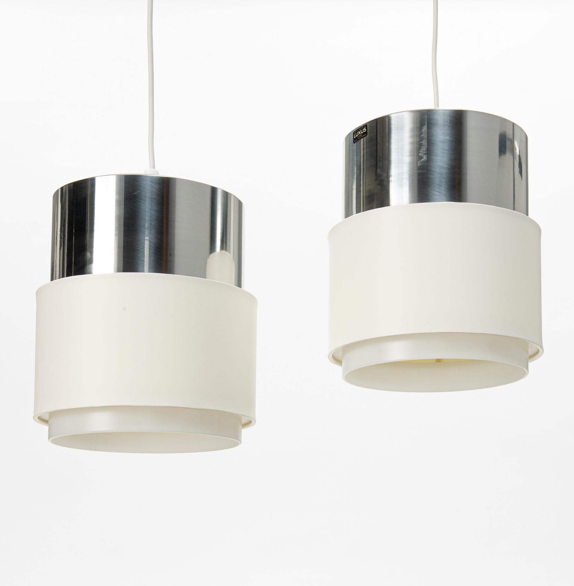 A pair of ceiling lights from the 'Cylindus' series, Luxus, Vittsjö, 1970's.