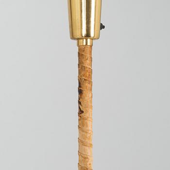 Lisa Johansson-Pape, Lattiavalaisin, Stockmann-Orno, 1900-luvun puoliväli. Korkeus 188 cm.