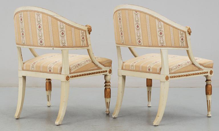 Two matched late Gustavian early 19th Century armchairs.