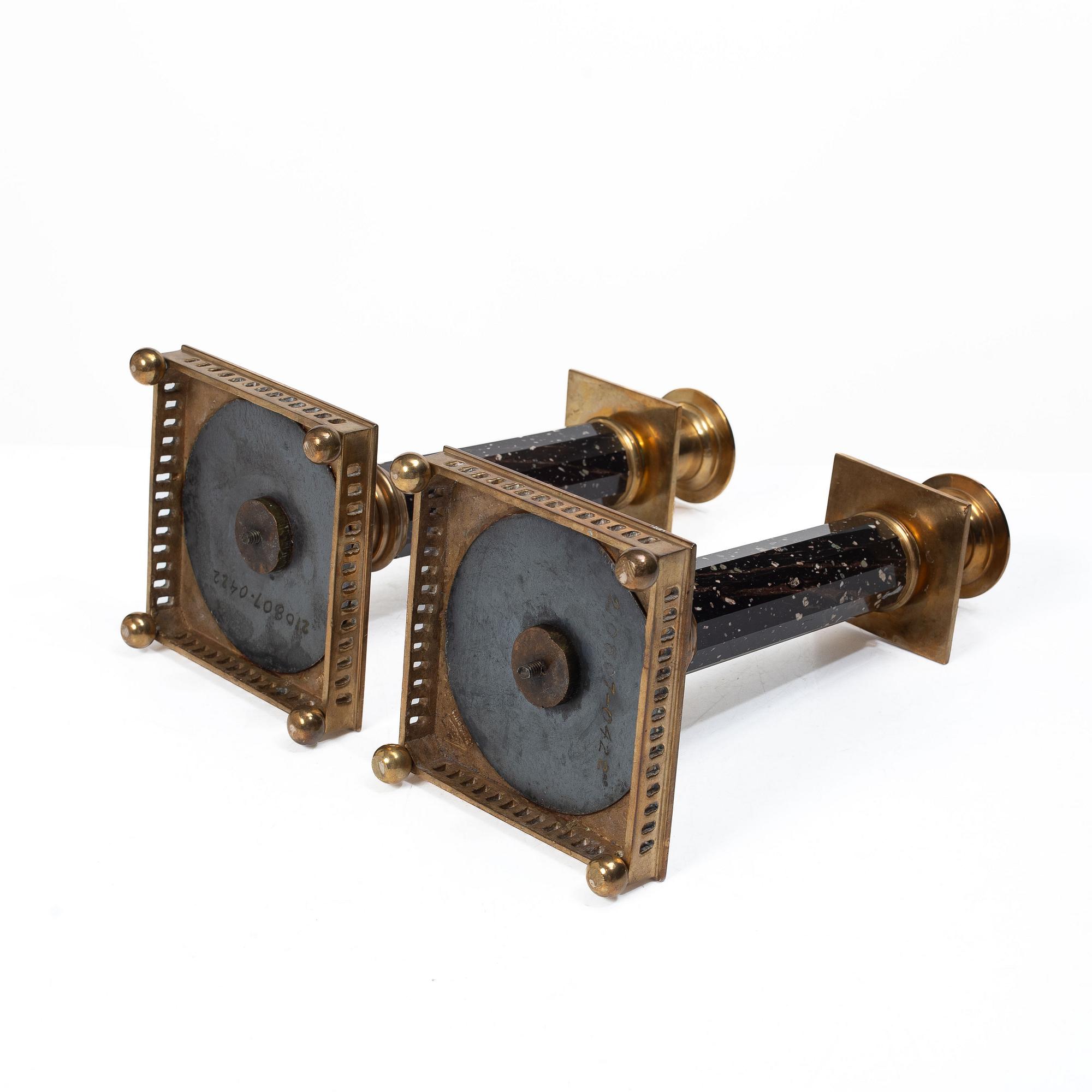 A pair of candlesticks brass and porphyry, EOS Jönköping, 20th century.