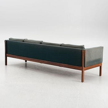 Hans J. Wegner, a model AP62/4 sofa and model AP62/1 armchiar,