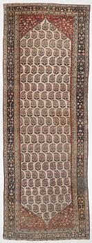 A Bakhtiari carpet, signed, c. 580 x 212 cm.