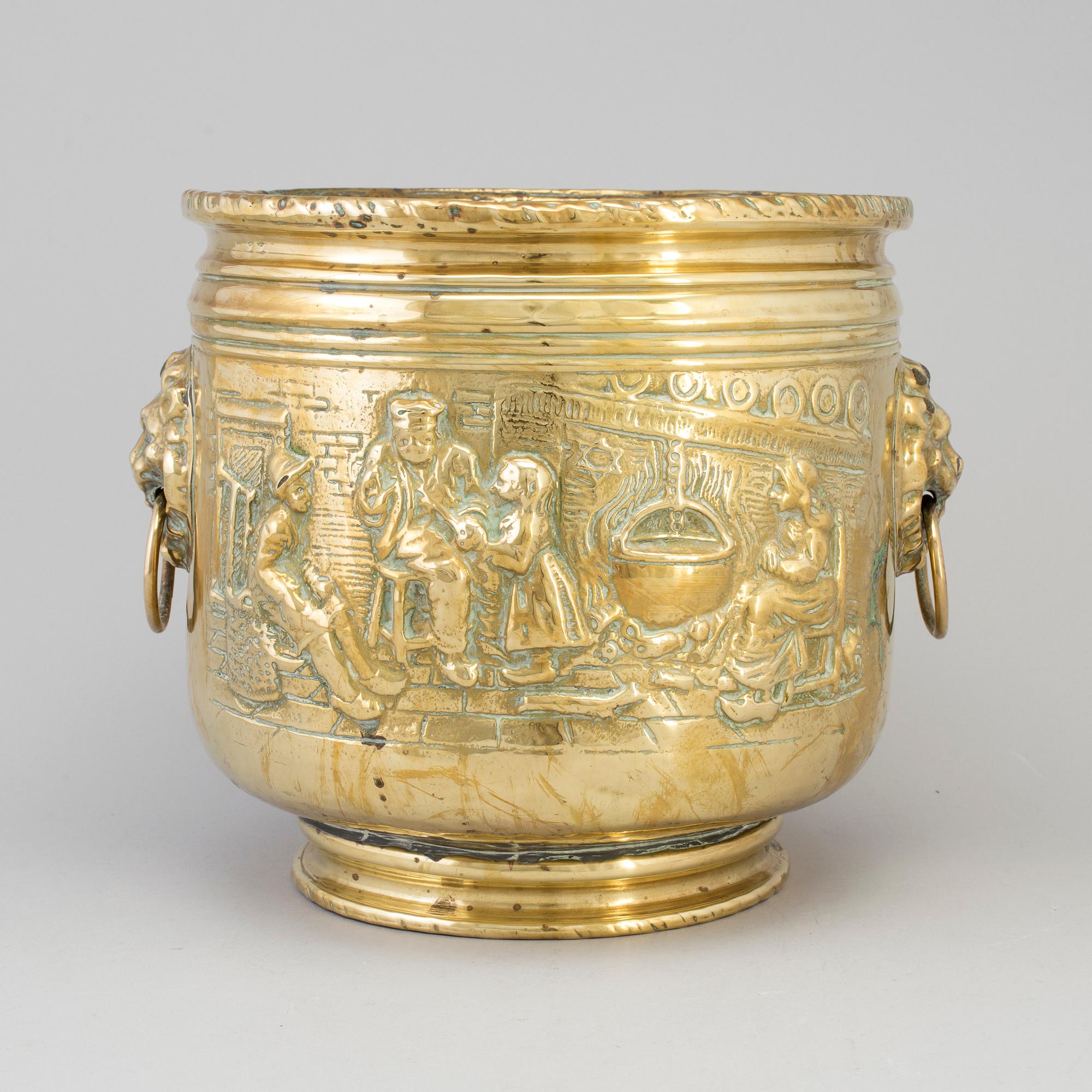 An 18th/19th century brass flower pot.