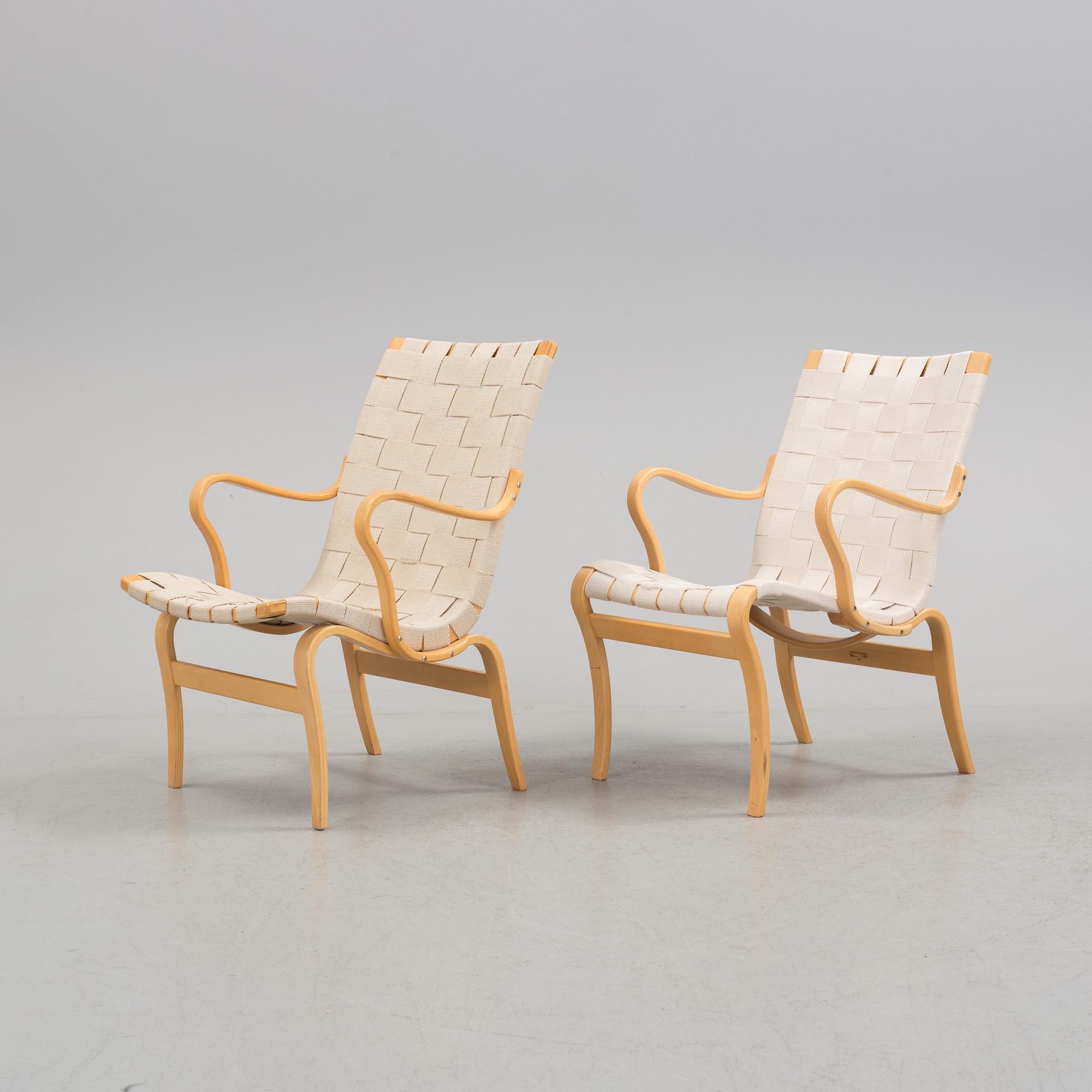 two armchairs by Bruno Mathsson, one "Eva" and one "Mina".