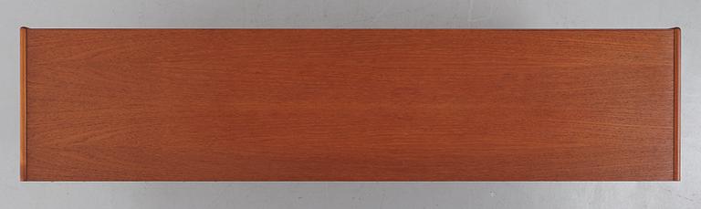 A late 20th Century teak veneered sideboard.