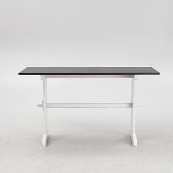 A painted table, 20th Century.