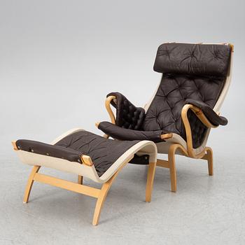 Bruno Mathsson, a 'Pernilla' armchair with ottoman, Dux.