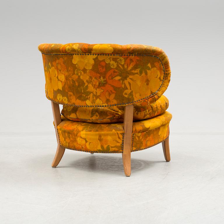 A mid 20th century "Schulz" easy chair by Otto Schulz.