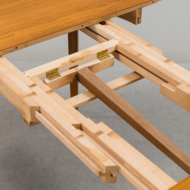 An oak dining table 'Herrgården' designed by Carl Malmsten, second half of the 20th century.