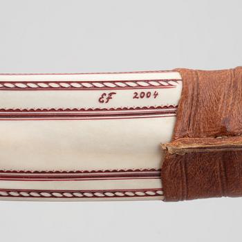 Erik Fankki, a reindeer horn knife, signed and dated 2004.