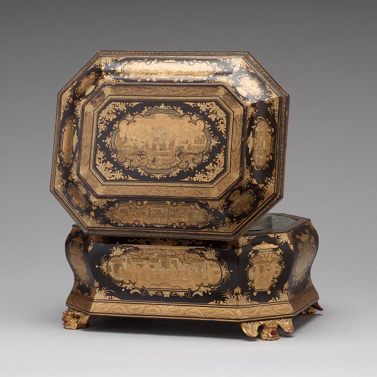 A lacquered tea box with pewter canisters, Qing dynasty, late 19th Century.