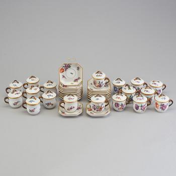 A set of 18 Royal Copenhagen Saxon Flower 1542 Custard Cups with Lids and Saucers.