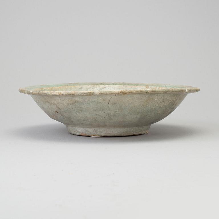 A Sawankhalok celadon dish, 15th century.