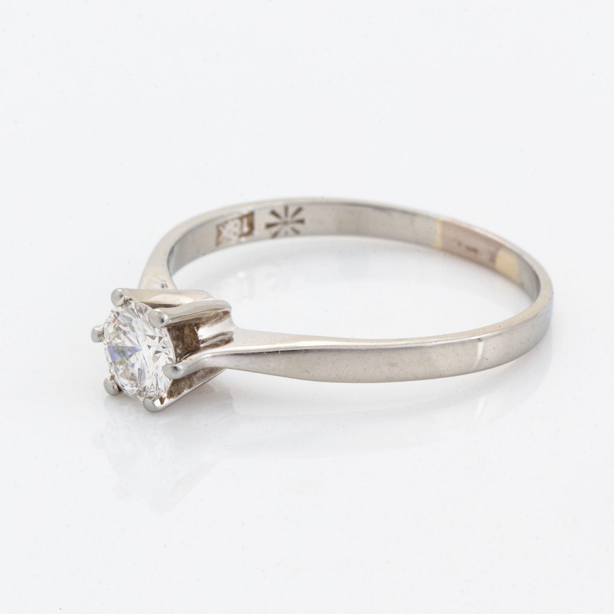 Brilliant-cut diamond ring.