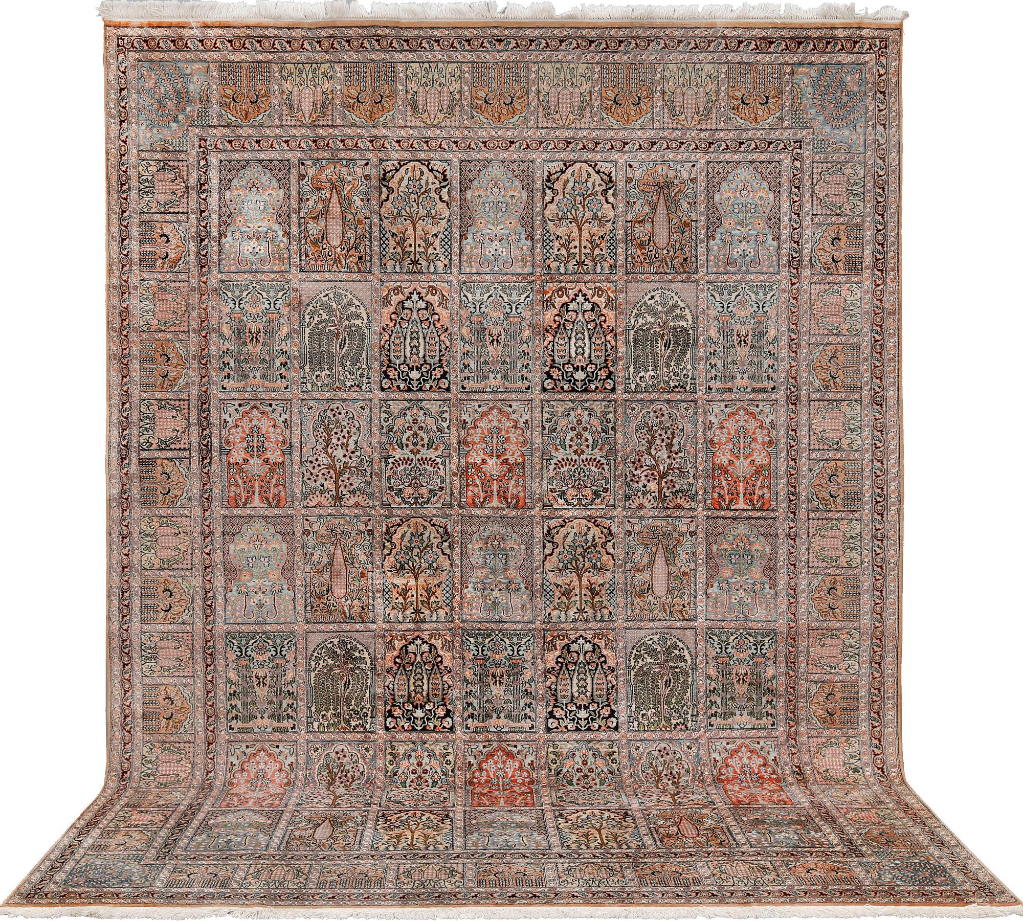 A silk Kashmir carpet, approx. 327 x 243 cm.