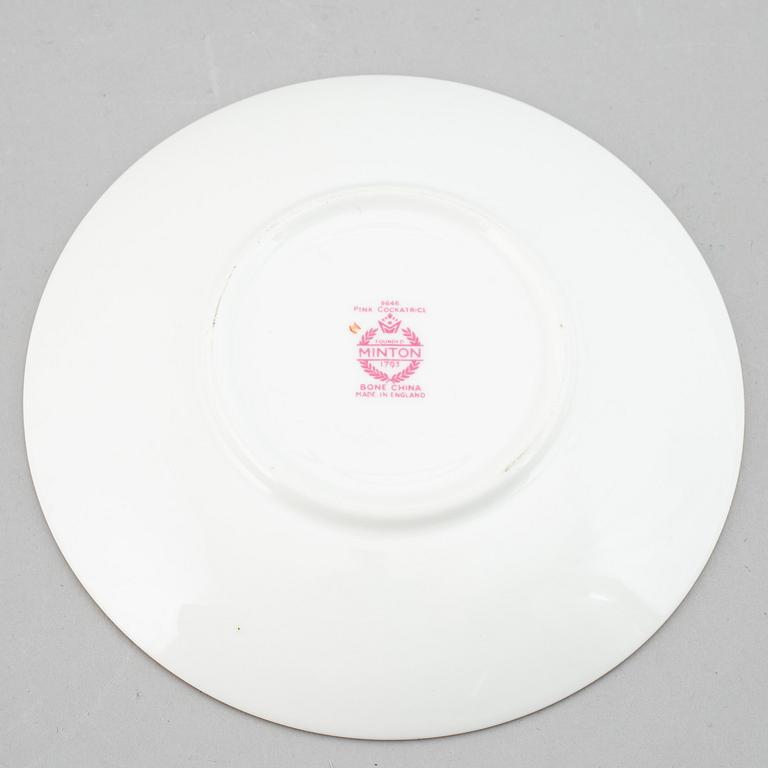 A part 'Pink Cockatrice' dinner and coffee and tea service, England, Minton, early 20th century (123 pieces).