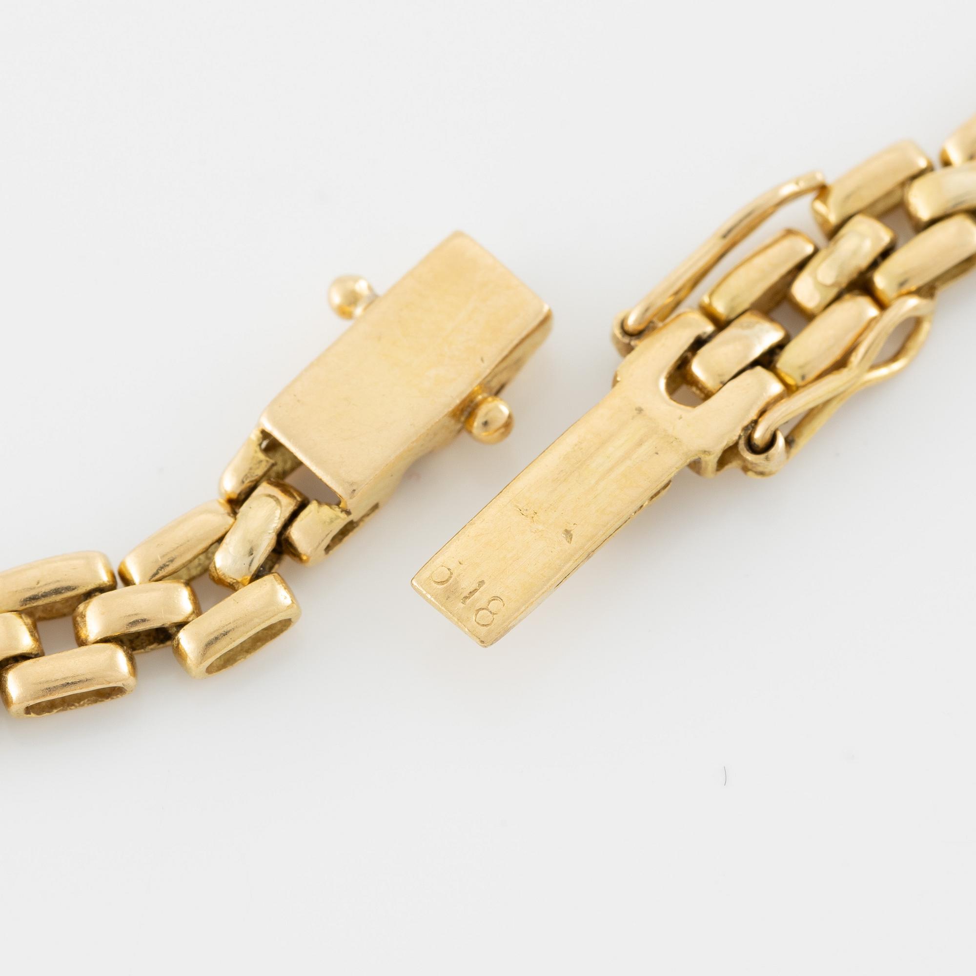 Necklace, 18K gold in the form of a panther with diamonds and rubies.