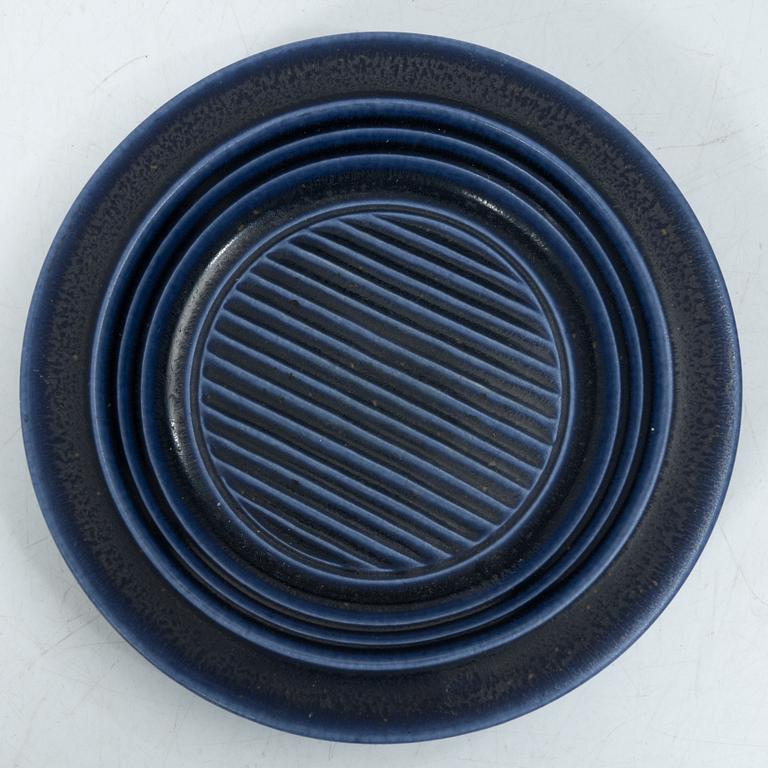 Kåge Verkstad, a set of three ceramic bowls and a small dish, Gustavsberg, Sweden, 1957-61.