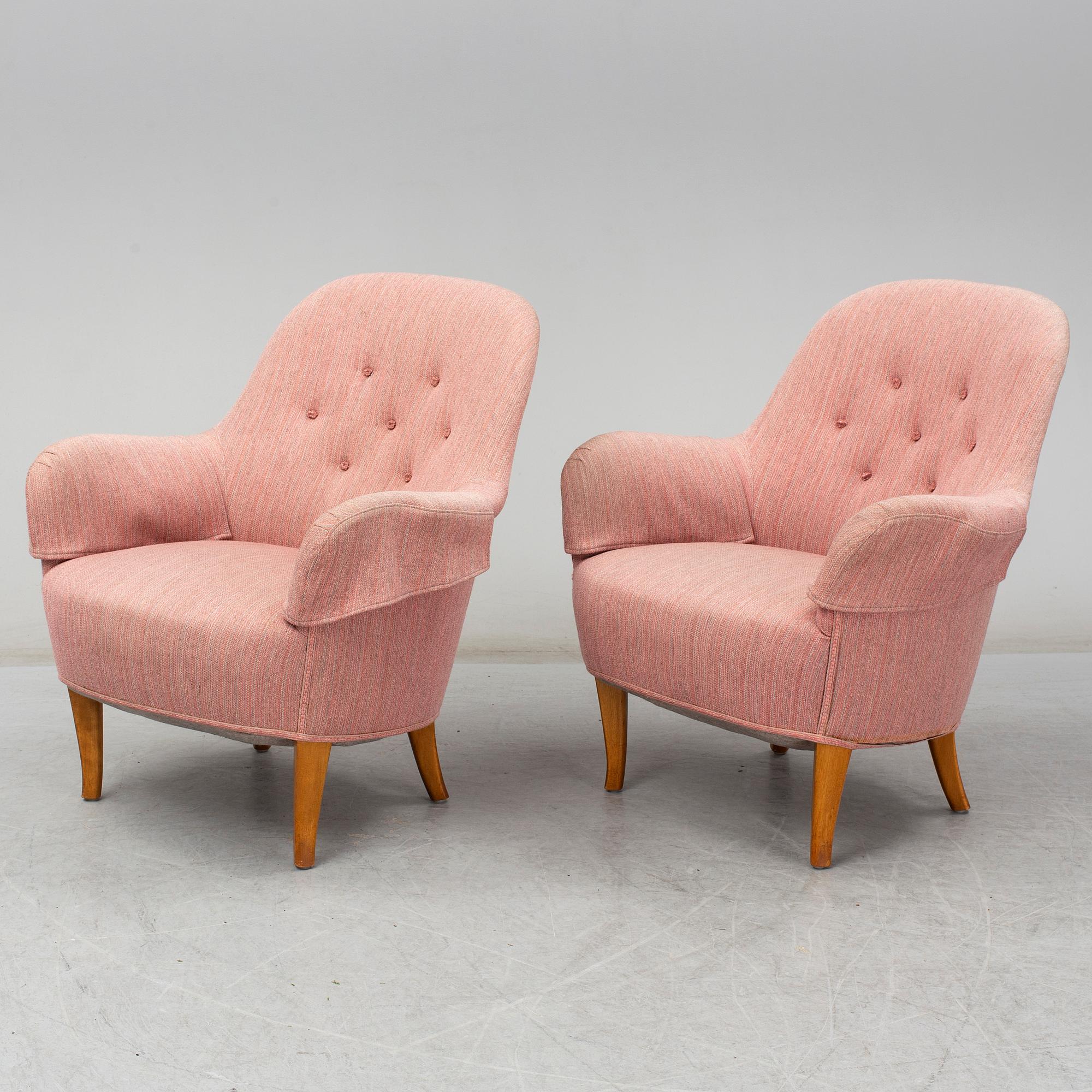 A pair of second half of the 20th Century 'Cirkus' easy chairs by Carl Malmsten.