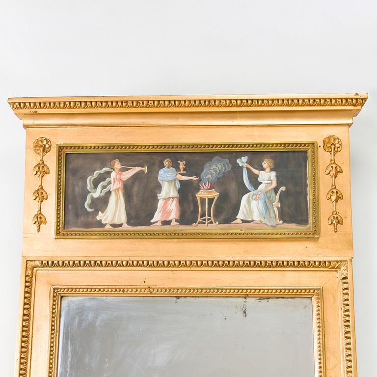 An Empire mirror, first half of the 19th century.