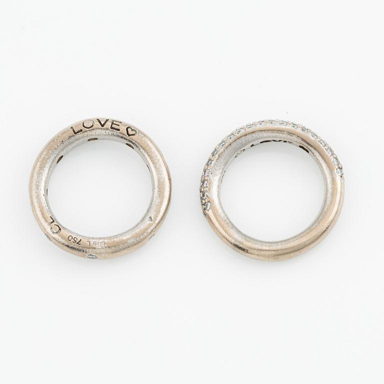 Ole Lynggaard two "Love" rings no. 4 in 18K white gold with round brilliant-cut diamonds.