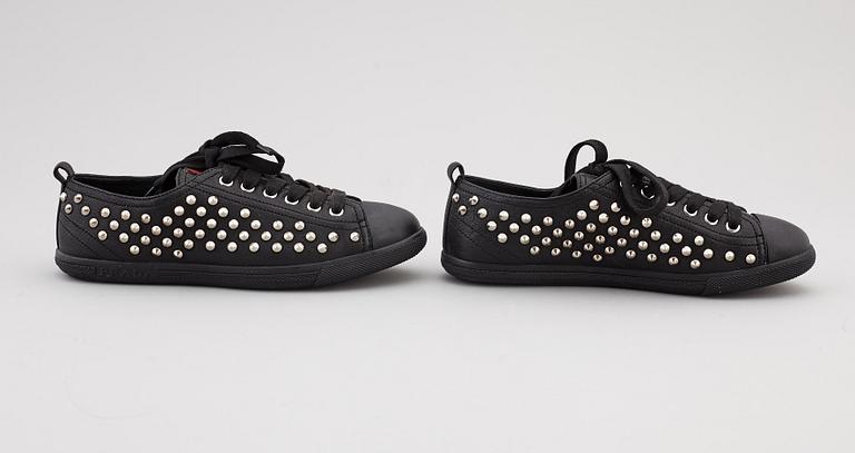 PRADA, two pairs of leather sneakers, size 35,5.