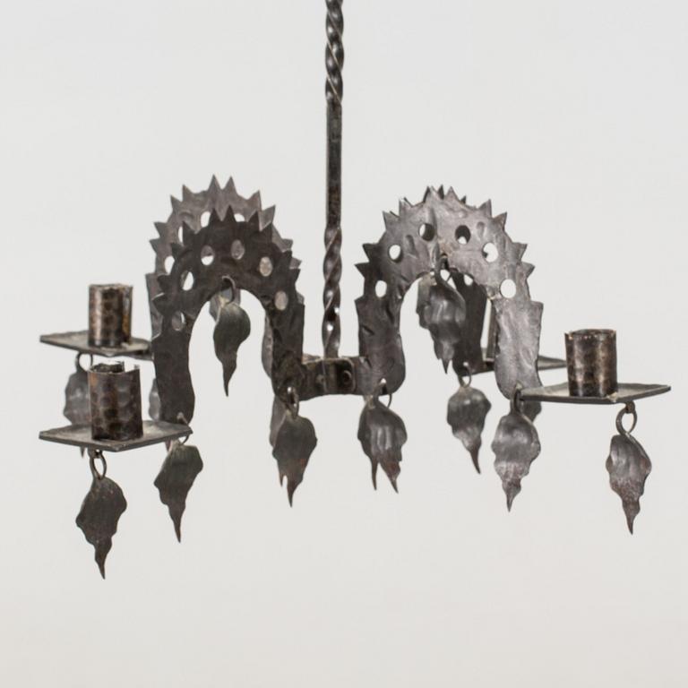A FOLKLORE LAMP 20TH CENTURY.