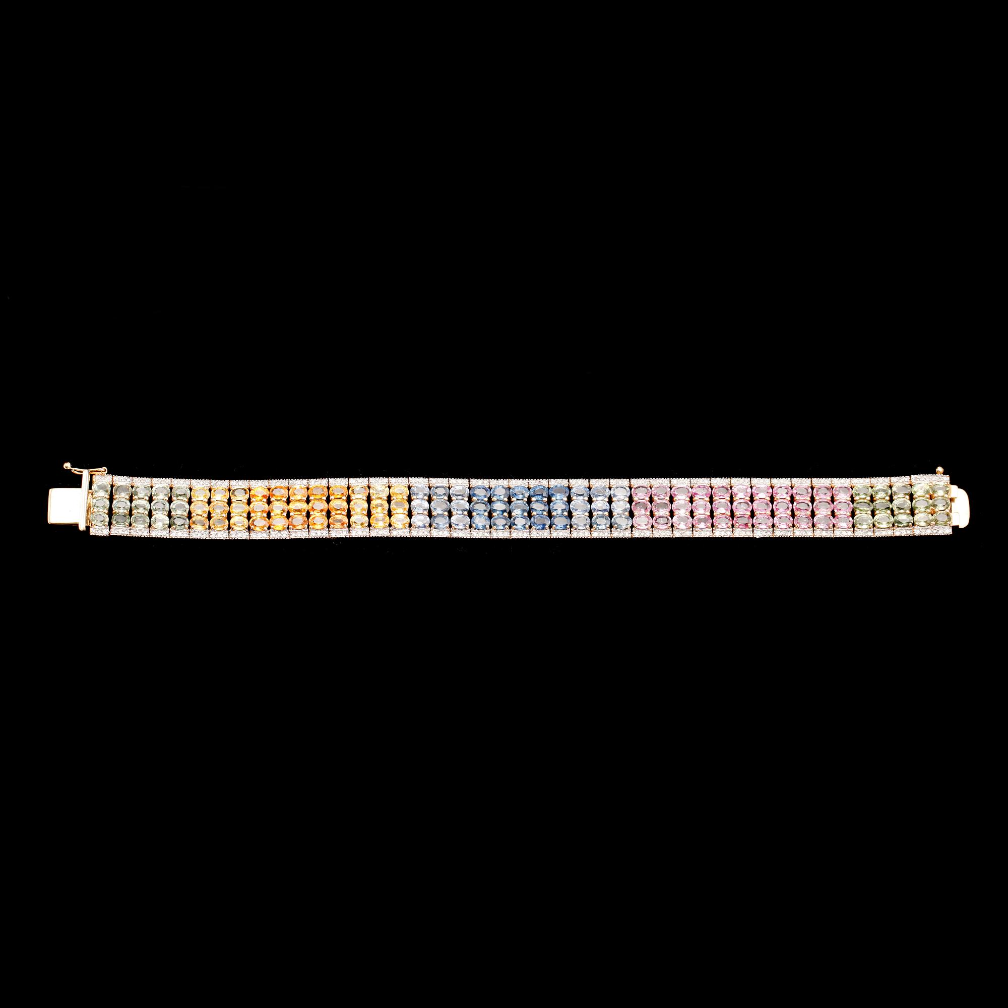 ARMBAND, 14 k guld, med olikfärgade ovala fasettslipade safirer och diamanter.