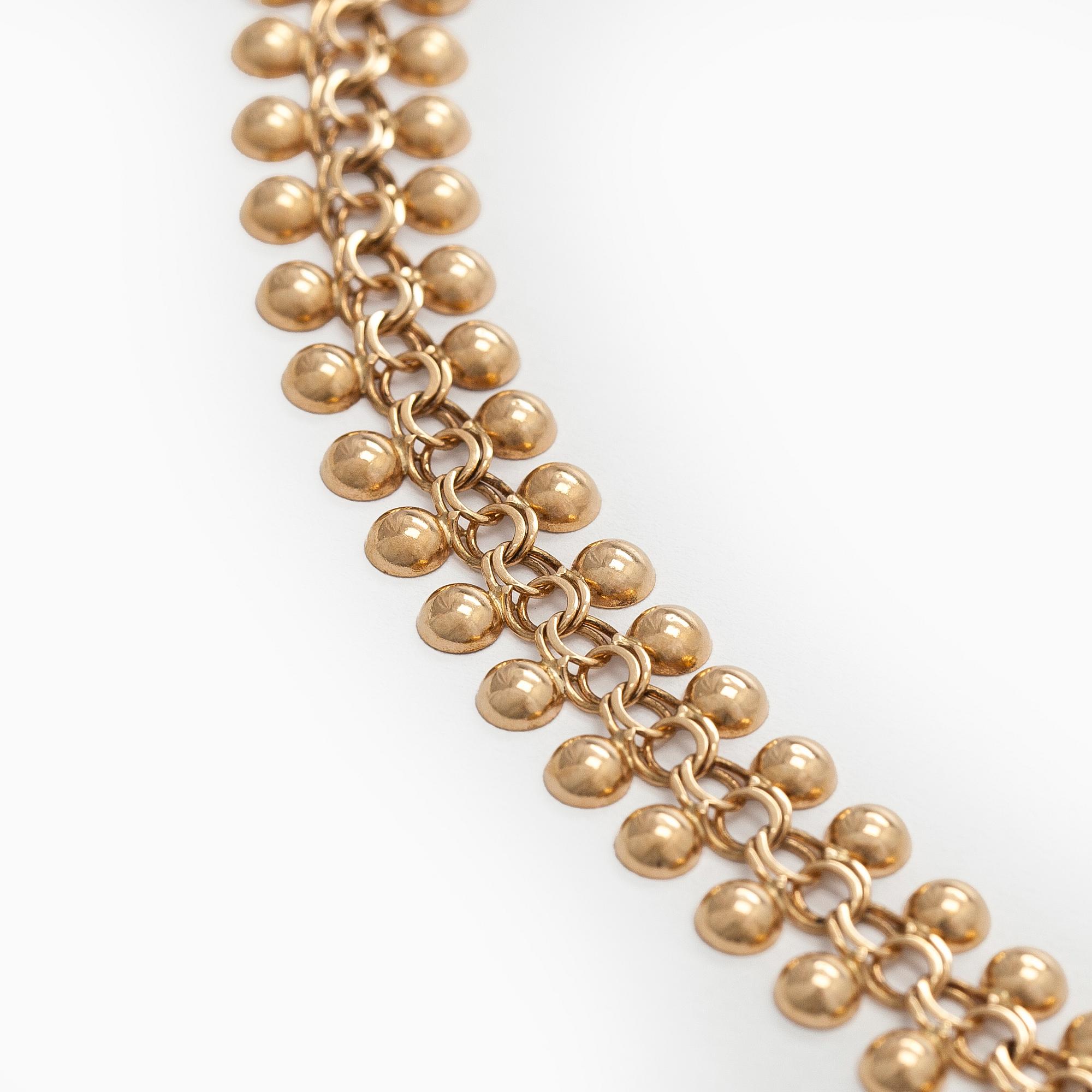 A 14K gold necklace.