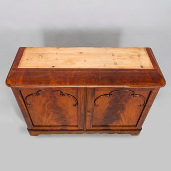 A 1830s/40s mahogany book case cabinet.