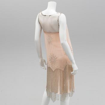 A coctaildress by Jenny Peckham, size 10.