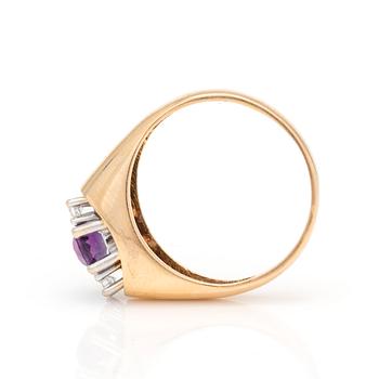 A ring with faceted amethyst and diamonds.