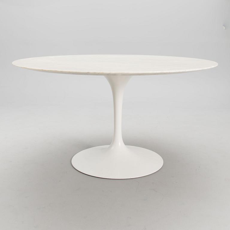 A mid-20th century 'Tulip' table.