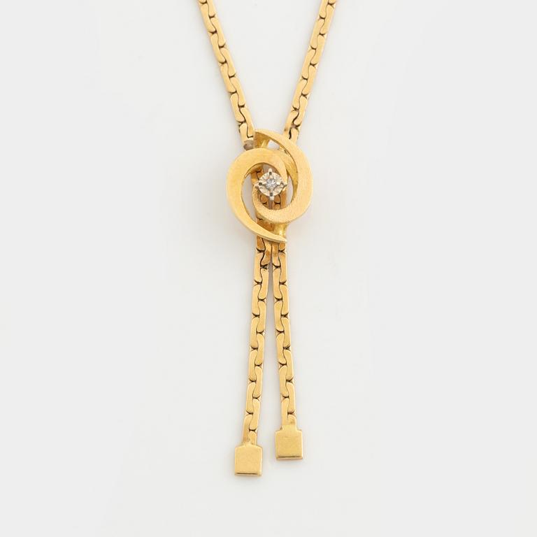 Collier, 18K guld med liten diamant.