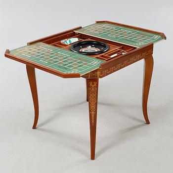 A gaming table and two chairs from Italy, 1950s.