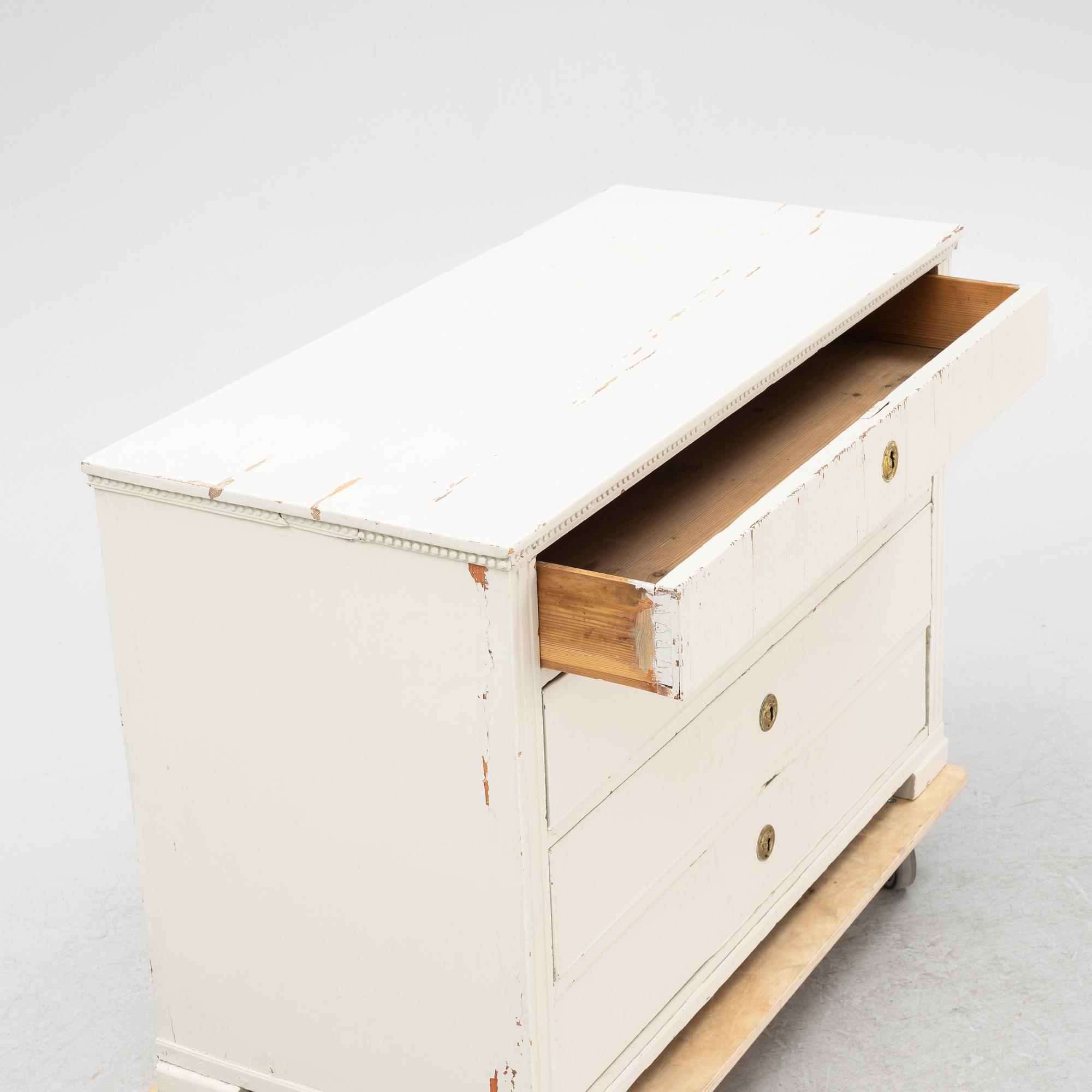 A painted chest of drawers, 19th Century.