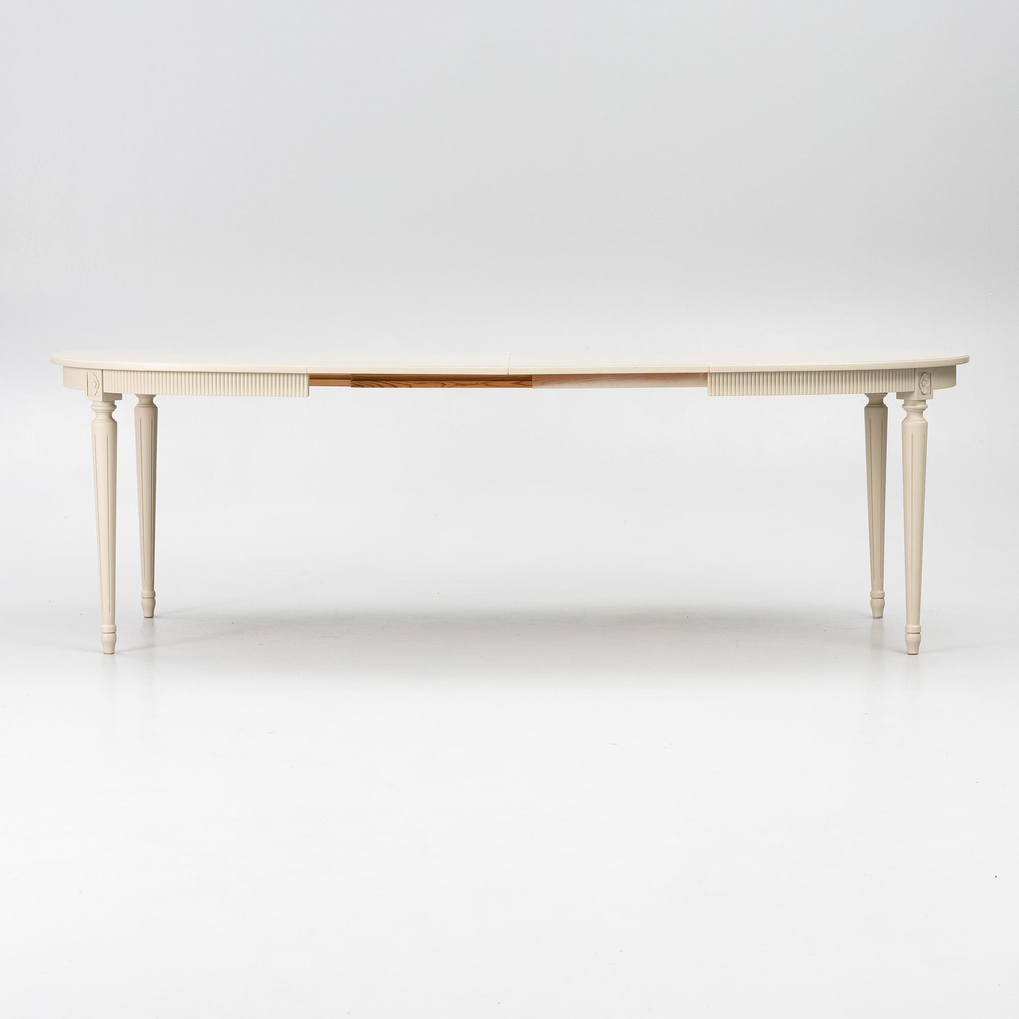 A dining table with 10 chairs, Gustavian Style dining suite, second half of the 20th century.