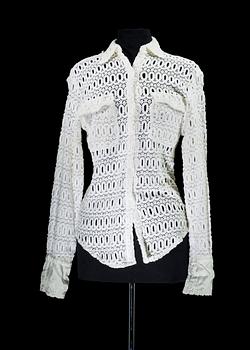 A white cottonlace shirt by Anna Sui.