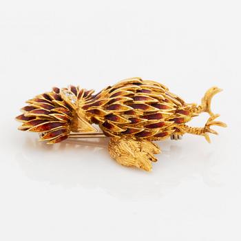 An 18K gold and enamel bird brooch set with eight-cut diamonds.